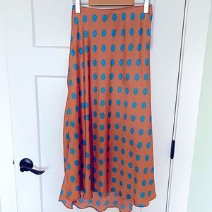 Silk midi skirt with polka dots in size small